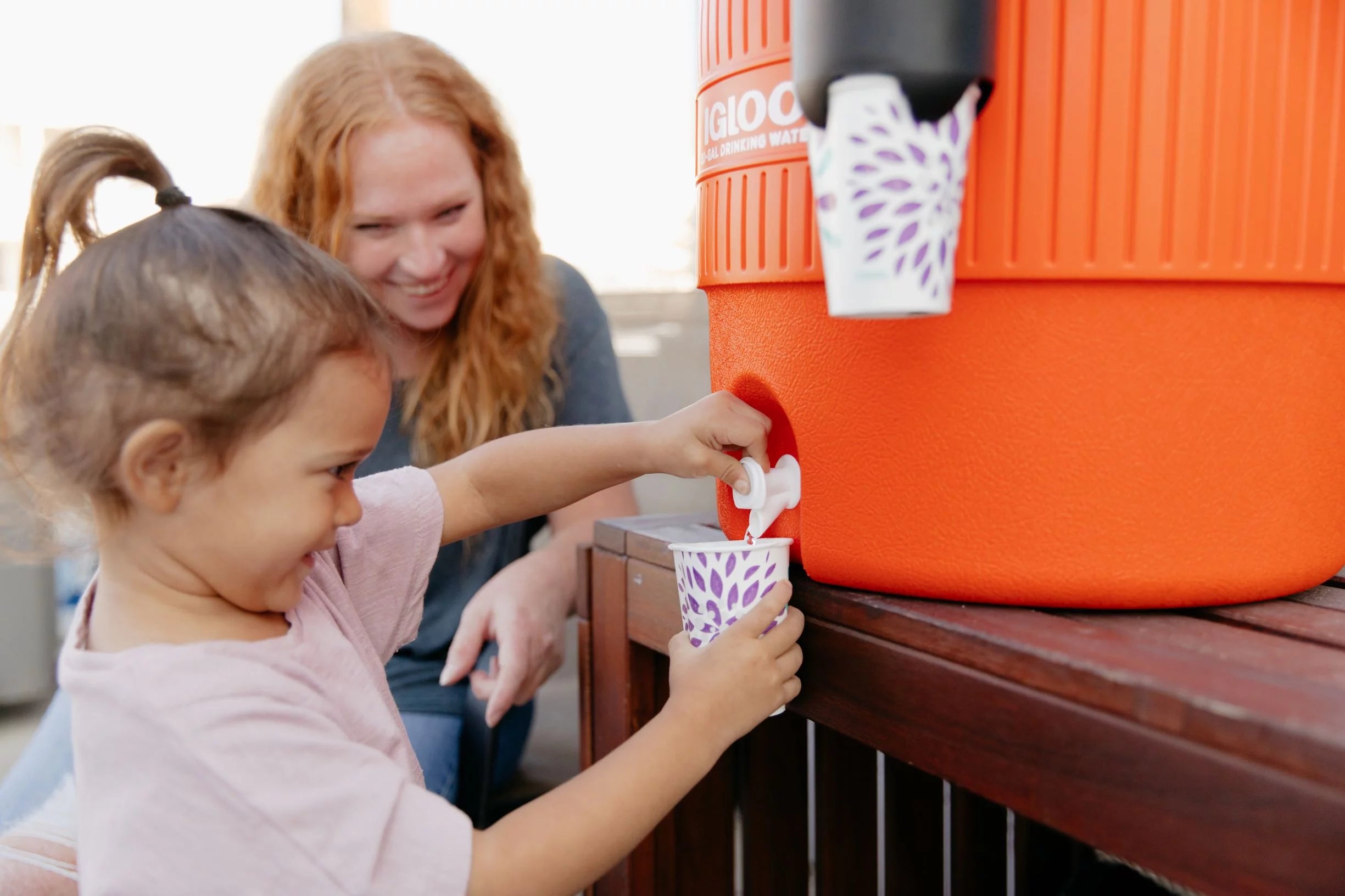 Orange 10-Gallon Water Jug with Cup Dispenser Q274
